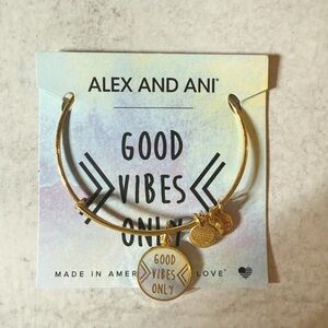 Alex and Ani charm bangle.